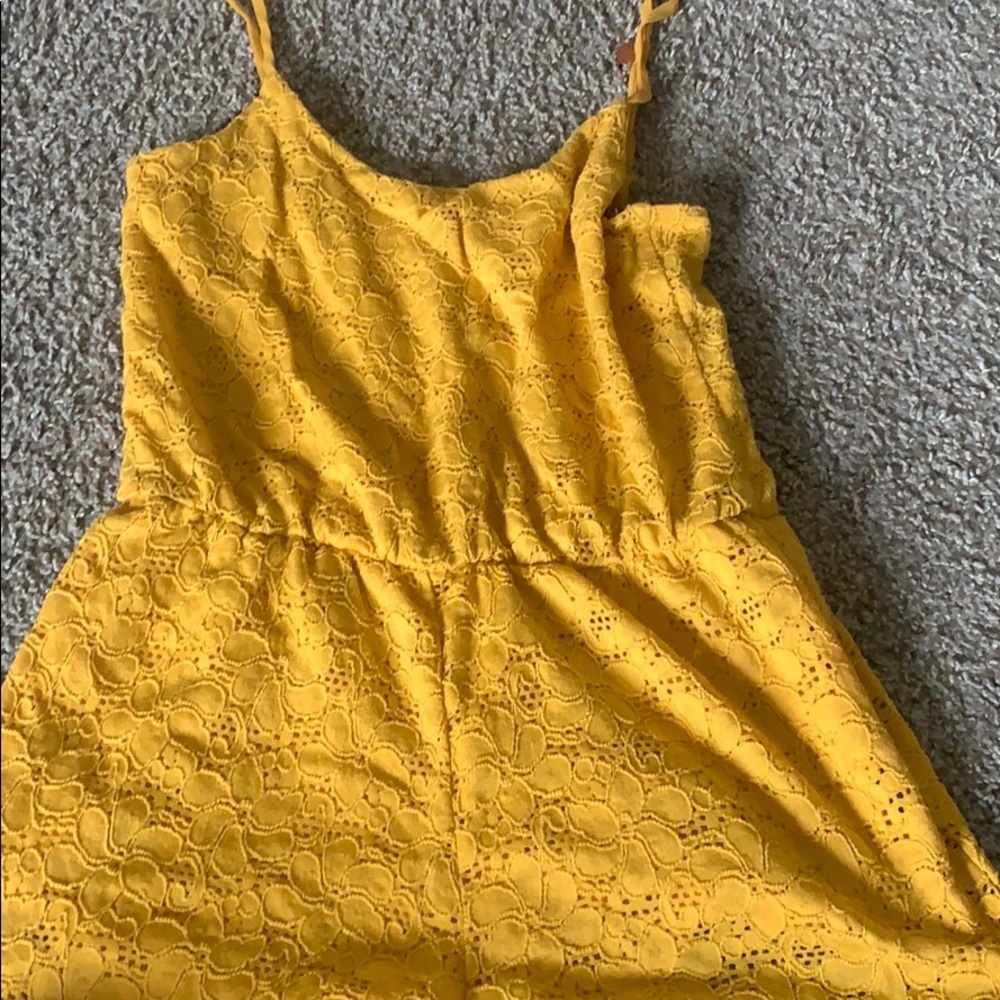 Papaya yellow romper with flower detail size small